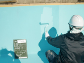 豊中市立第十六中学校プール槽塗装改修工事_施工中の写真04